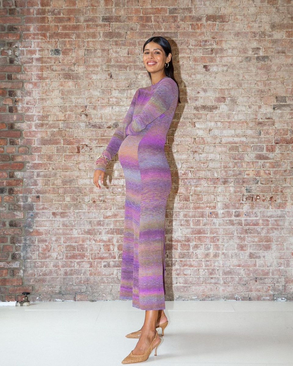 Babba wearing a knit dress