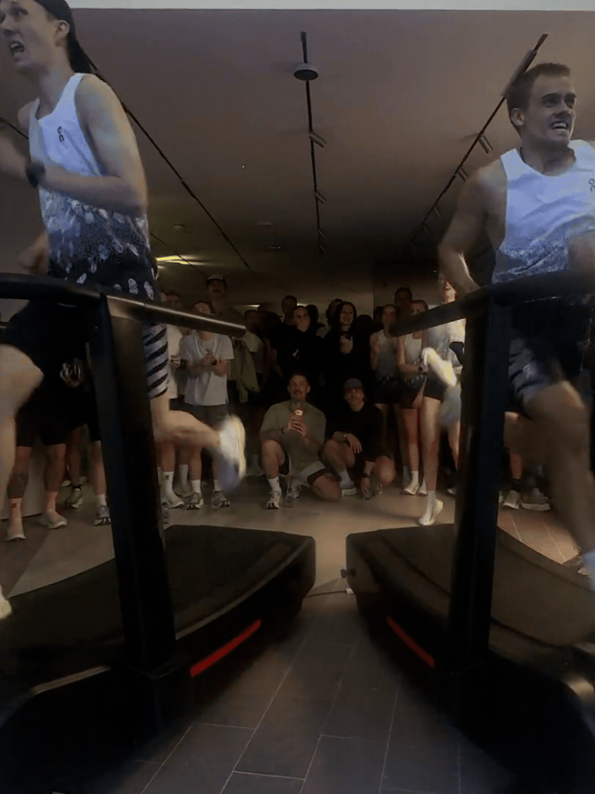 Two runners on a treadmill compete in a sprinting challenge